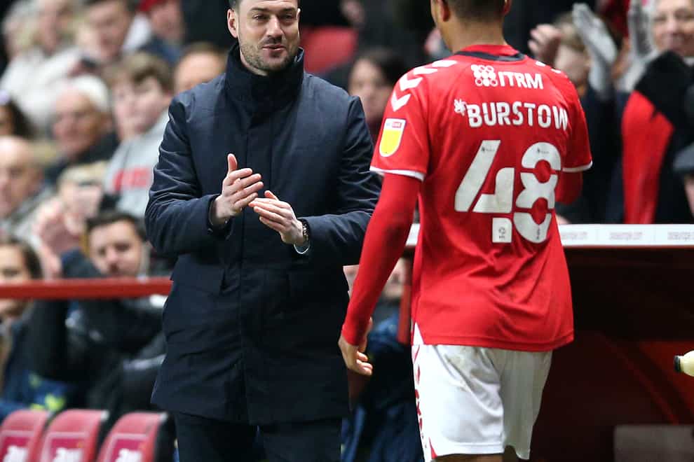 Charlton’s Mason Burstow is congratulated by manager Johnnie Jackson (Nigel French/PA)