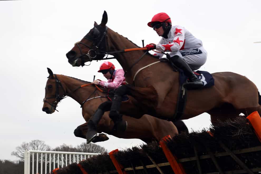 Aiden Coleman riding Brewin’upastorm (left) on their way to winning the Weatherbys Cheltenham Festival Betting Guide Hurdle during day three of The Winter Million Festival at Lingfield Park Racecourse, Surrey. Picture date: Sunday January 23, 2022.