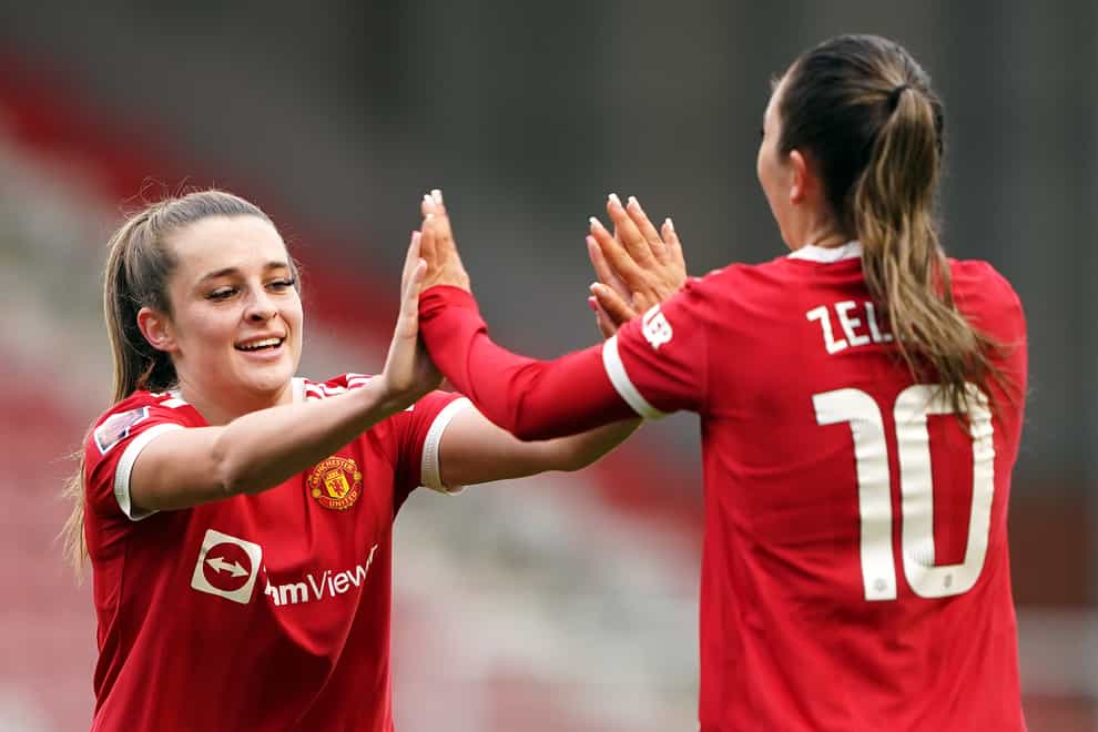 Manchester United’s Ella Toone (left) and Katie Zelem celebrate their side’s first goal of the game (Zac Goodwin/PA)
