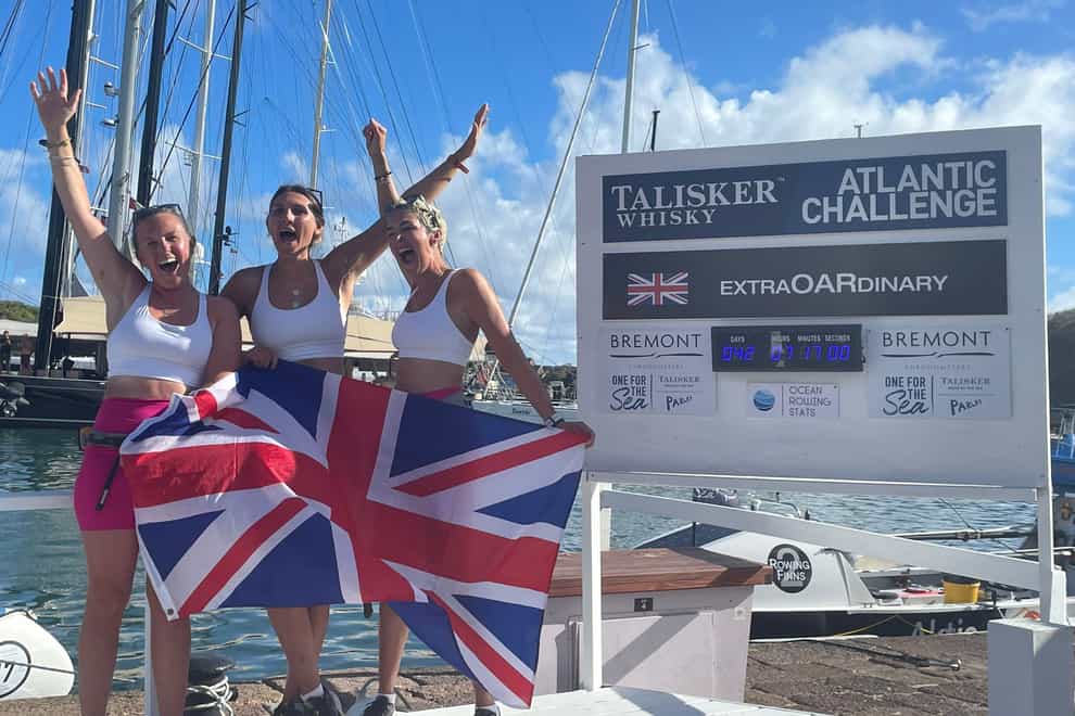 L-R British rowers Abby Johnston, Charlotte Irving and Kat Cordiner smashed the world record for rowing across the Atlantic (PA).