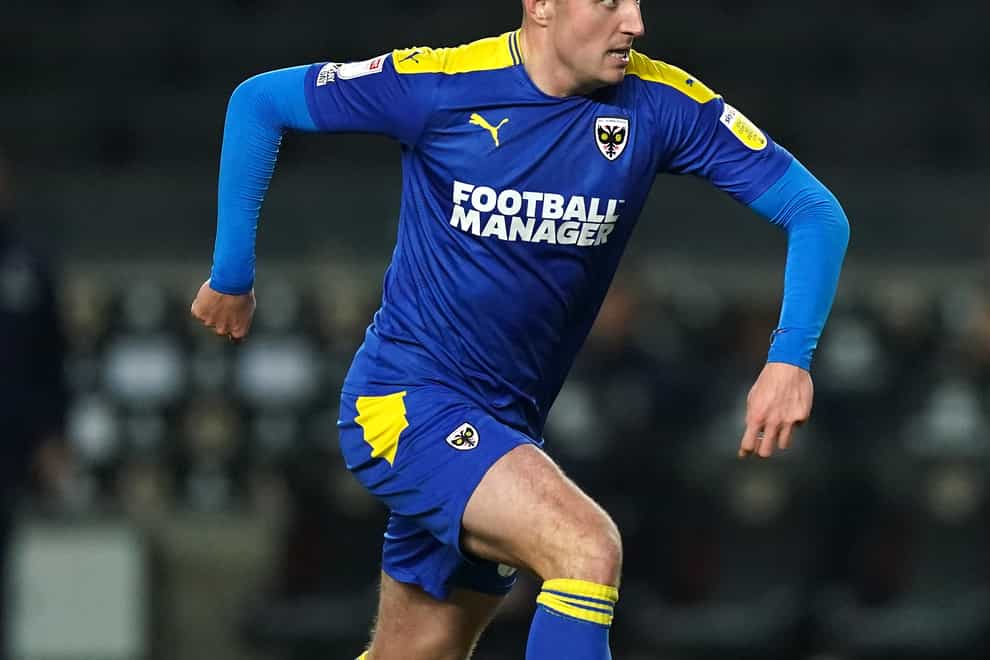 AFC Wimbledon’s Anthony Hartigan could return for the visit of Ipswich (Mike Egerton/PA)