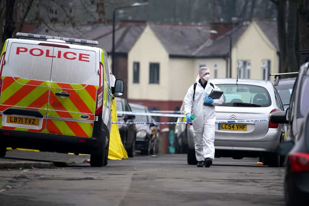 Greater Manchester Police at the scene on Thirlmere Avenue (Peter Byrne/PA)