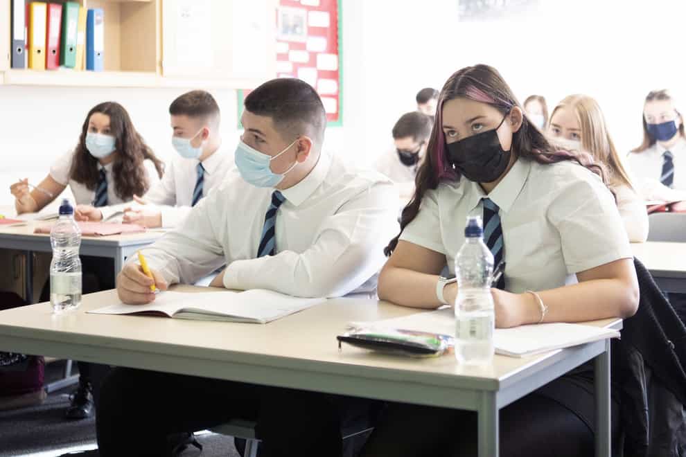 Students in Welsh schools will continue to wear face coverings until at least the February half-term break (Jane Barlow/PA)