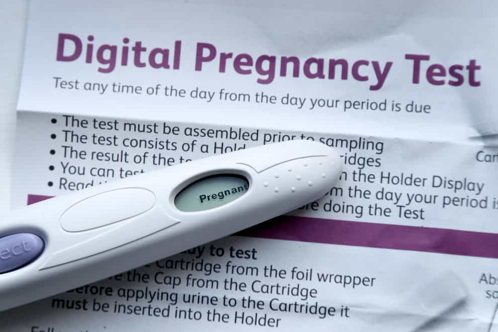 A pregnancy test kit indicating pregnancy (Gareth Fuller/PA)
