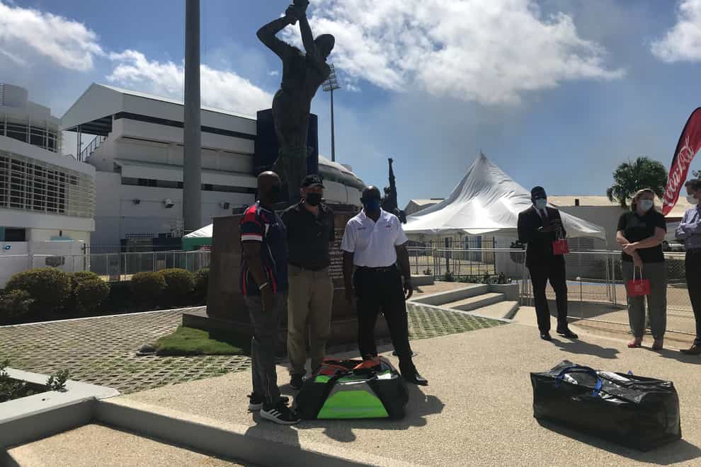 Roland Butcher, right, was speaking at an event outside the Kensington Oval in Barbados (PA)