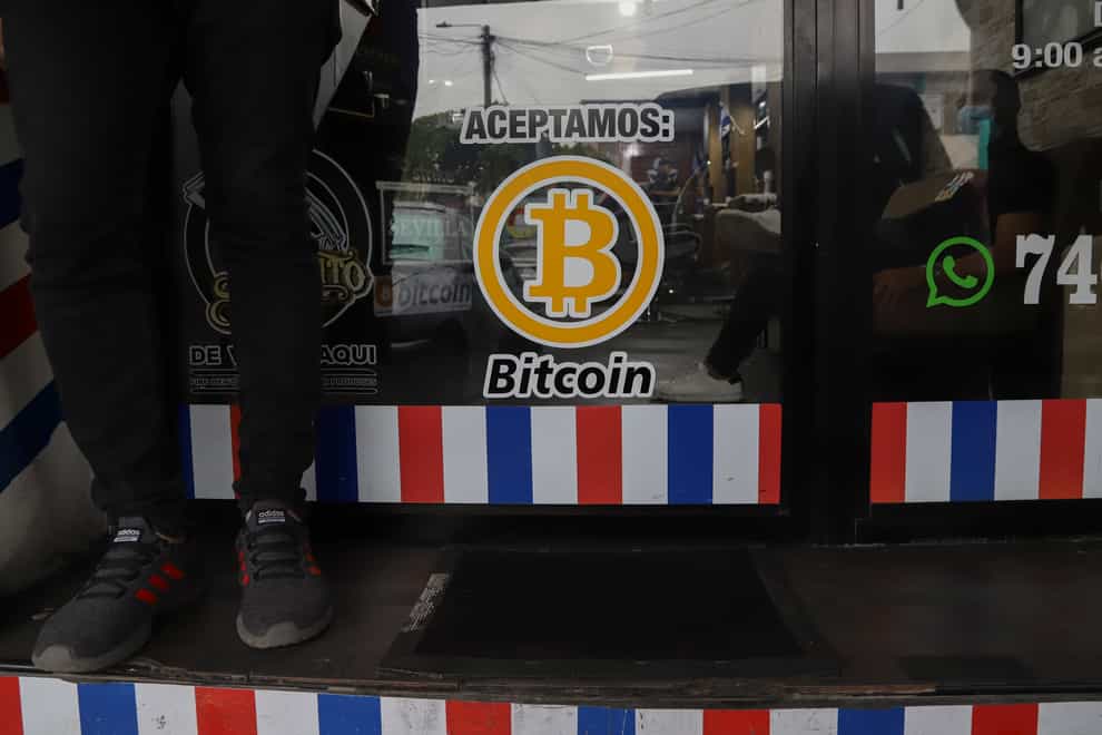 “We accept Bitcoin” is announced at a barber shop in Santa Tecla, El Salvador (Salvador Melendez/AP)