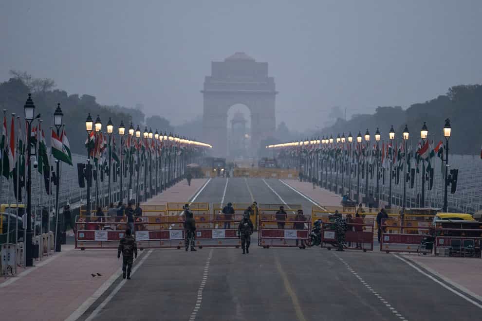 Rajpath, the ceremonial boulevard for Republic Day parade leading to landmark war memorial India Gate, is barricaded on the eve of Republic Day celebrations in New Delhi, India (Altaf Qadri/AP)