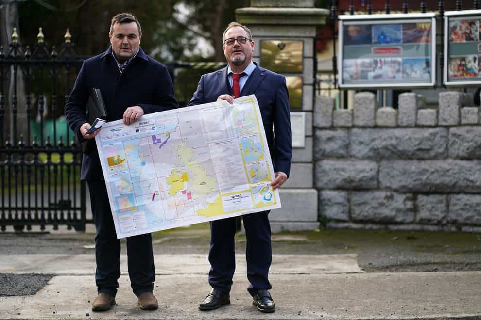 Brendan Byrne, left, CEO of the Irish Fish Processors and Exporters Association, and Patrick Murphy, CEO of the Irish South and West Fish Producers Organisation, outside the Russian embassy in Dublin (Brian Lawless/PA)