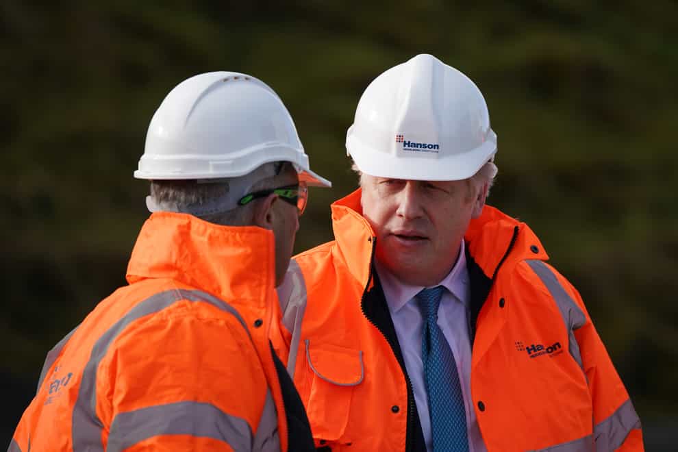 Prime Minister Boris Johnson during a visit to Hanson Aggregates in Penmaenmawr, North Wales (Peter Byrne/PA)