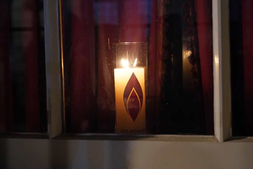 A candle in the window of 10 Downing Street to mark Holocaust Memorial Day (Ian West/PA)
