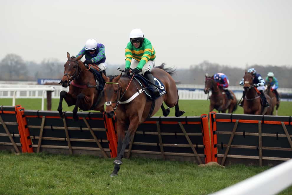 Champ ridden by Jonjo O’Neill Jr. on their way to winning the Howden Long Walk Hurdle during day two of the Howden Christmas Racing Weekend at Ascot Racecourse, Berkshire. Picture date: Saturday December 18, 2021 (Nigel French/PA)