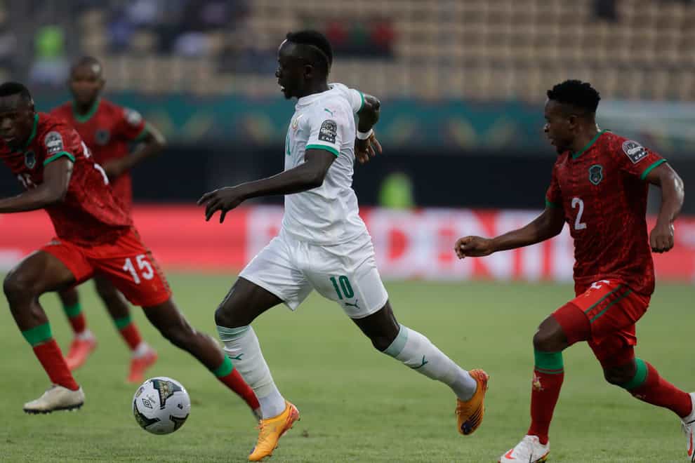 Sadio Mane, centre, looks set to feature for Senegal in the Africa Cup of Nations on Sunday (Sunday Alamba/AP)