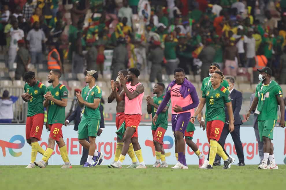 Cameroon players celebrate their victory over Gambia (Sunday Alamba/AP).