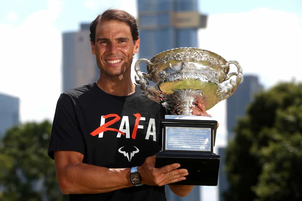 Rafael Nadal holds the Norman Brookes Challenge Cup on Monday (Hamish Blair/AP)