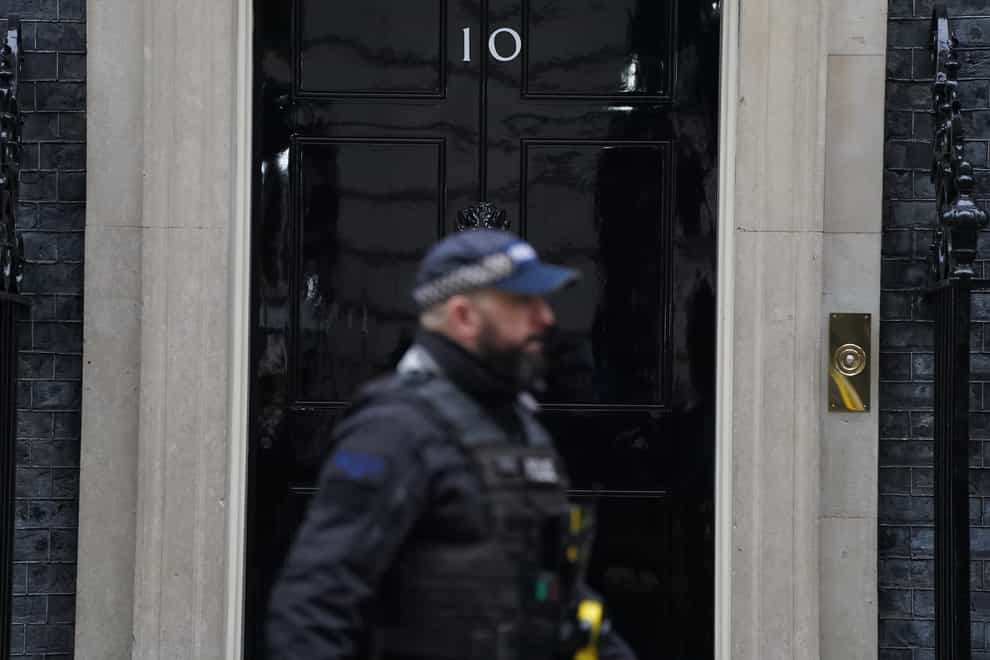 A police officer outside 10 Downing Street (Stefan Rousseau/PA