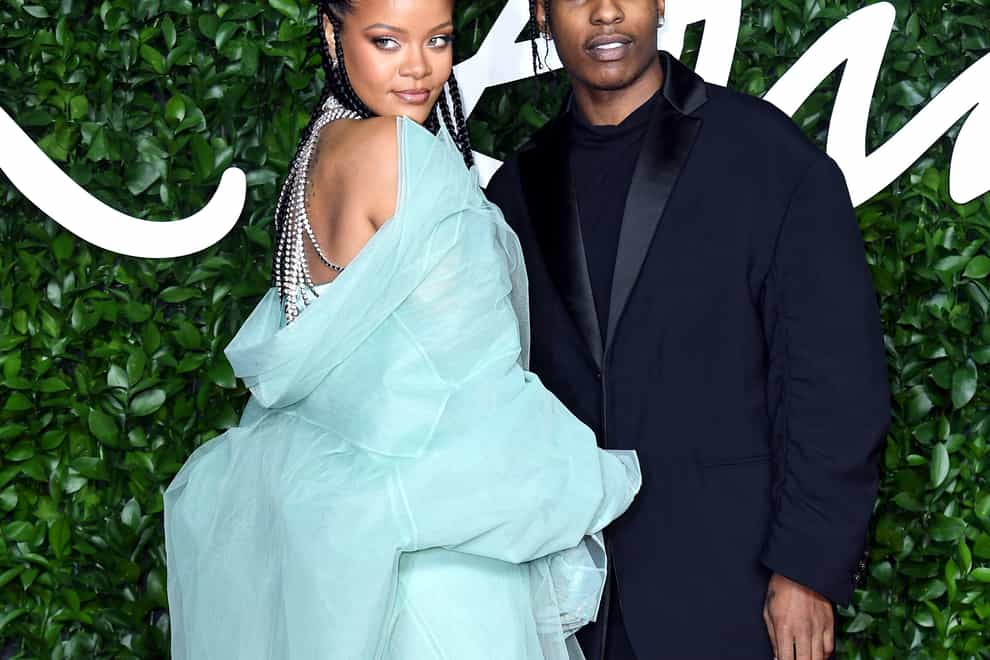 Rihanna has been pictured with a baby bump alongside boyfriend ASAP Rocky (Alamy/PA)