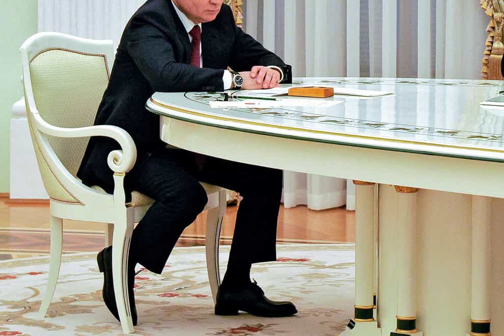 Russian President Vladimir Putin listens to Hungary’s Prime Minister Viktor Orban during their meeting in the Kremlin in Moscow (Mikhail Klimentyev, Sputnik, Kremlin Pool Photo via AP)