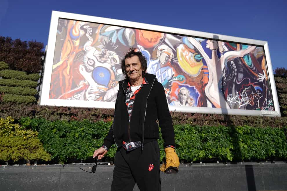 Ronnie Wood at the unveiling of his new painting of the Rolling Stones, reproduced on a giant billboard, at Westfield London (Kirsty O’Connor/PA)