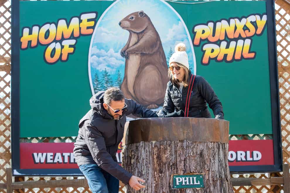 Tony and Anne Disorbo, of Connecticut, check out Gobbler’s Knob the day before Groundhog Day in Punxsutawney (Mark Pynes/The Patriot-News via AP)