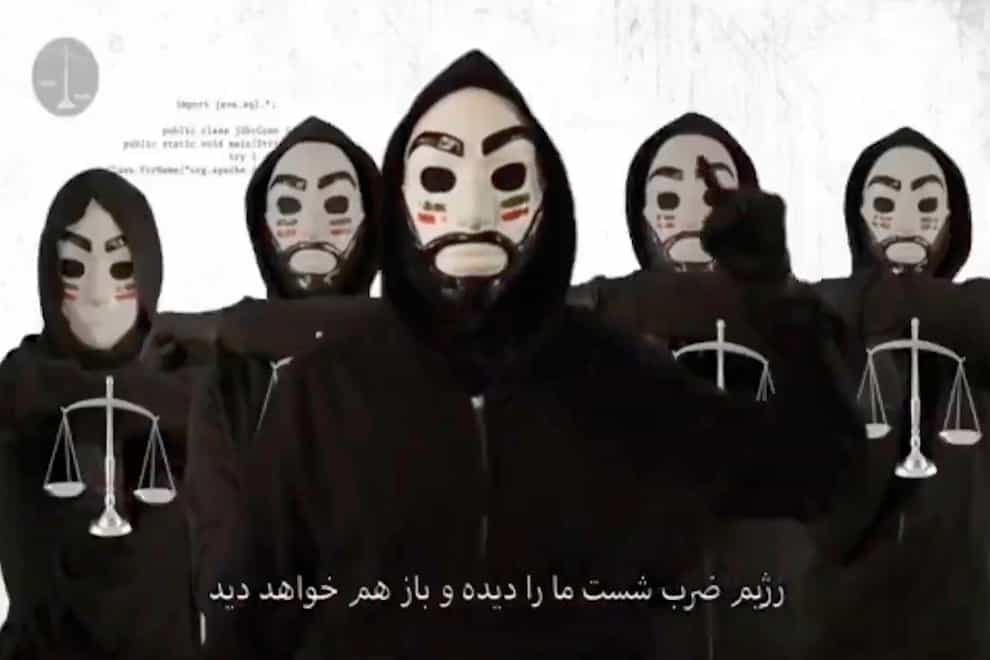 In this screenshot from video, a purported dissident message is seen from an online account calling itself “The Justice of Ali” that reportedly played overtop of an Iranian state television streaming feed on Tuesday, Feb. 1, 2022. A streaming website that features Iranian state television programming has acknowledged suffering technical issues amid reports that dissident hackers played an anti-government message on the platform. The caption at the bottom of the image in Farsi reads: “The regime has tasted our blows and it will taste it again.” (AP Photo)