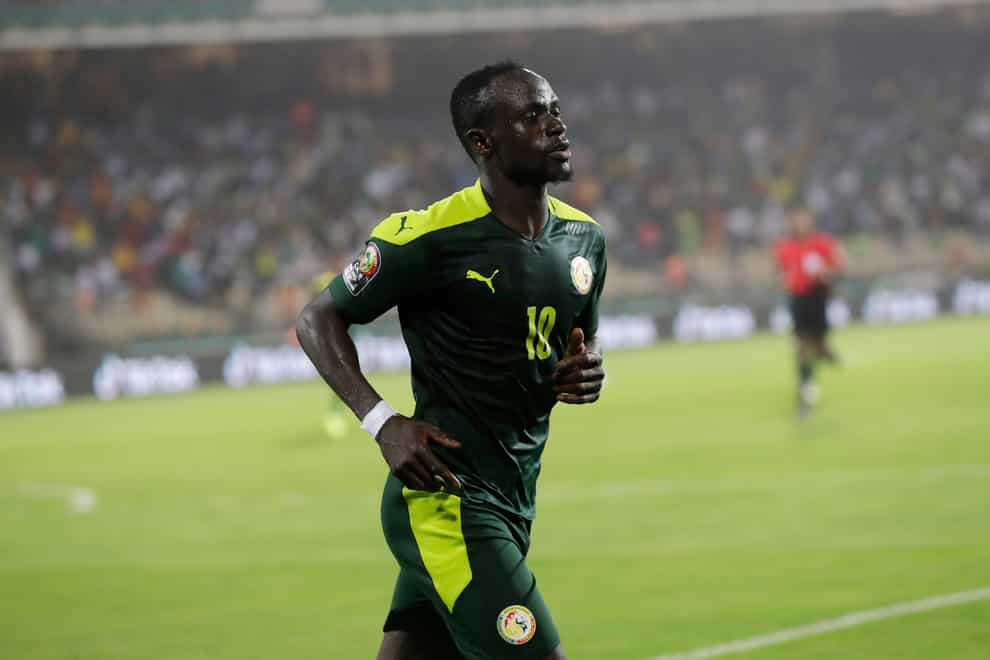 Senegal’s Sadio Mane celebrates after scoring his side’s third goal in the semi-final against Burkina Faso (Sunday Alamba/AP/Press Association Images)