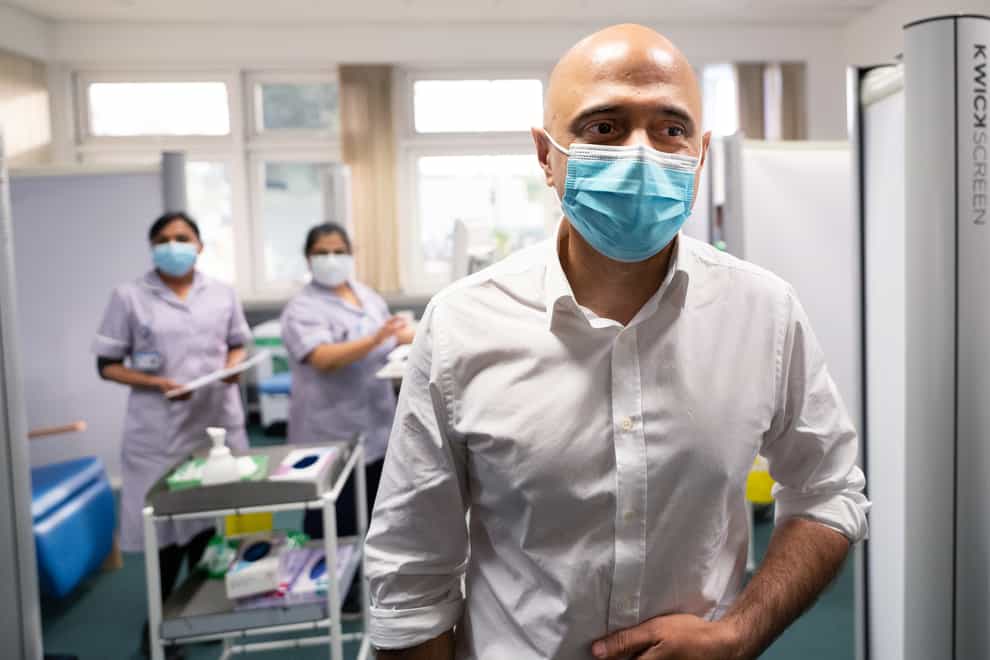 Health secretary, Sajid Javid visits St George’s Hospital in south west London where he talked to staff and met Covid 19 patients who are being treated with a new anti-viral drug. The coronavirus booster programme continues across the UK with the government’s aim to offer everyone a booster jab by the end of the year. Picture date: Wednesday December 22, 2021.