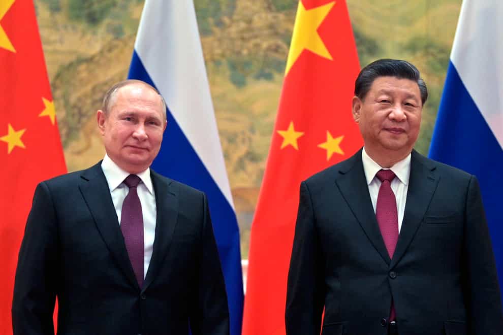 Vladimir Putin and Xi Jinping in Beijing (Sputnik via AP)