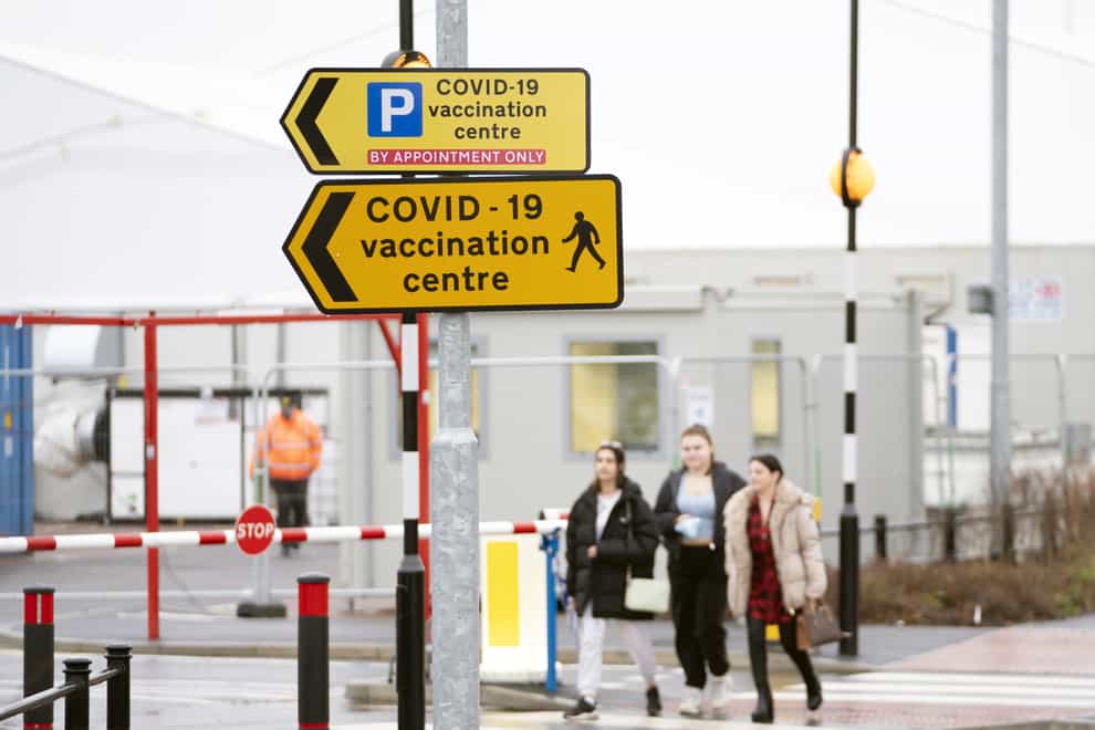 People arrive at a vaccination centre at Elland Road in Leeds (Danny Lawson/PA)