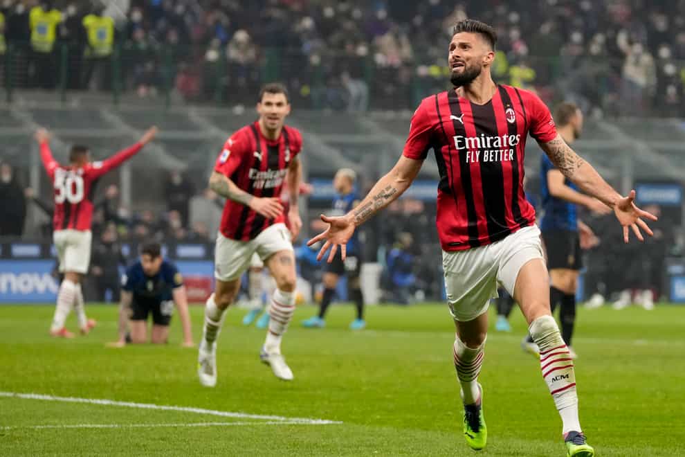 Olivier Giroud celebrates after scoring Milan’s second goal (Antonio Calanni/AP)