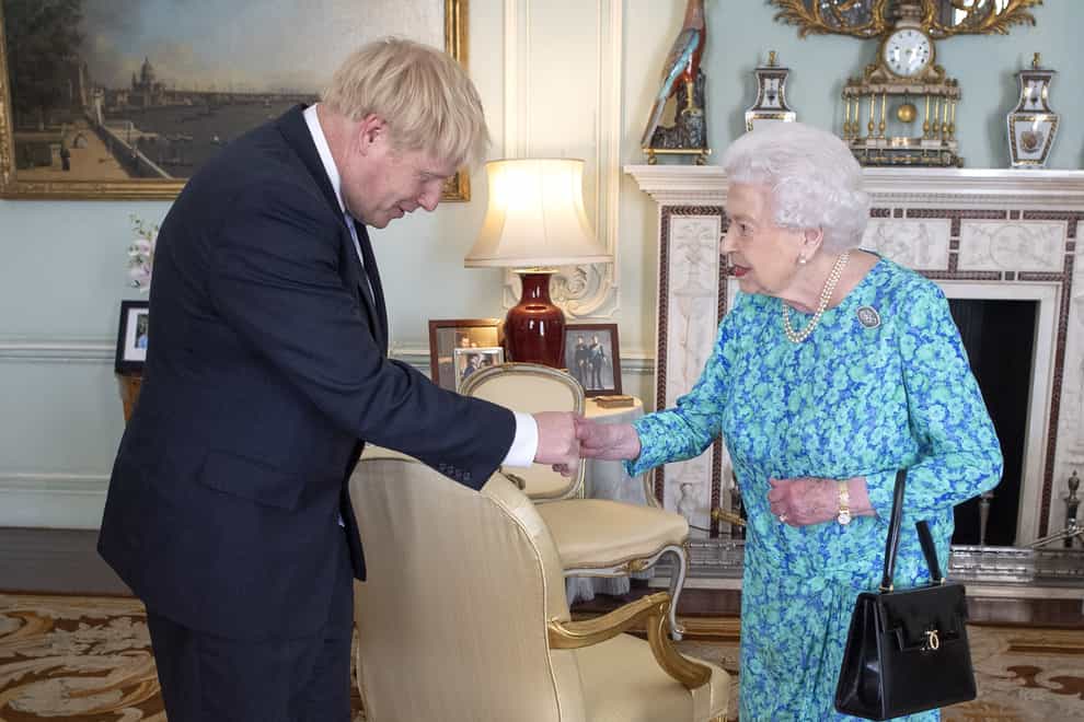 File photo dated 24/7/2019 of Queen Elizabeth II welcoming the newly-elected leader of the Conservative party Boris Johnson during an audience in Buckingham Palace, London. (Victoria Jones/PA)