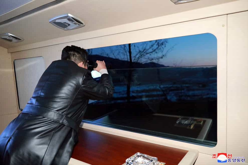 This picture provided by the North Korean government shows North Korean leader Kim Jong Un watching what it says was a test launch of a hypersonic missile in North Korea last month (Korean Central News Agency/Korea News Service via AP)