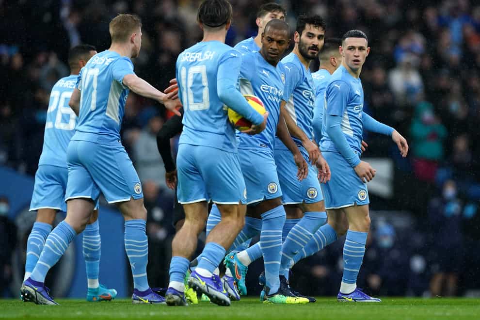 Manchester City’s Ilkay Gundogan (second right) celebrates his goal in the win over Fulham on Saturday (PA)