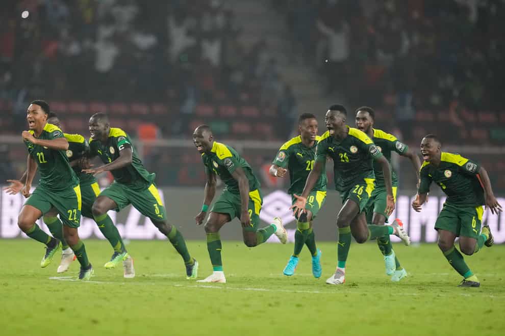 Senegal’s players celebrate a penalty shoot-out victory over Egypt in the Africa Cup of Nations final (Themba Hadebe/AP/PA)