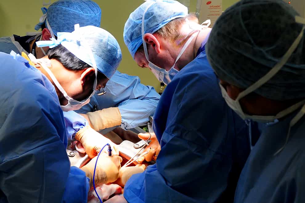 An operation taking place at Queen Elizabeth Hospital, Birmingham (Rui Vieira/PA)