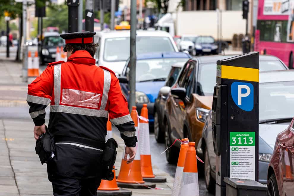 A traffic warden patrols the streets of Belfast city centre as the lockdown suspension of on-street parking charges in Northern Ireland is set to be lifted. Wardens will issue “warnings” to prepare the public for the return of charges and fines on June 29.