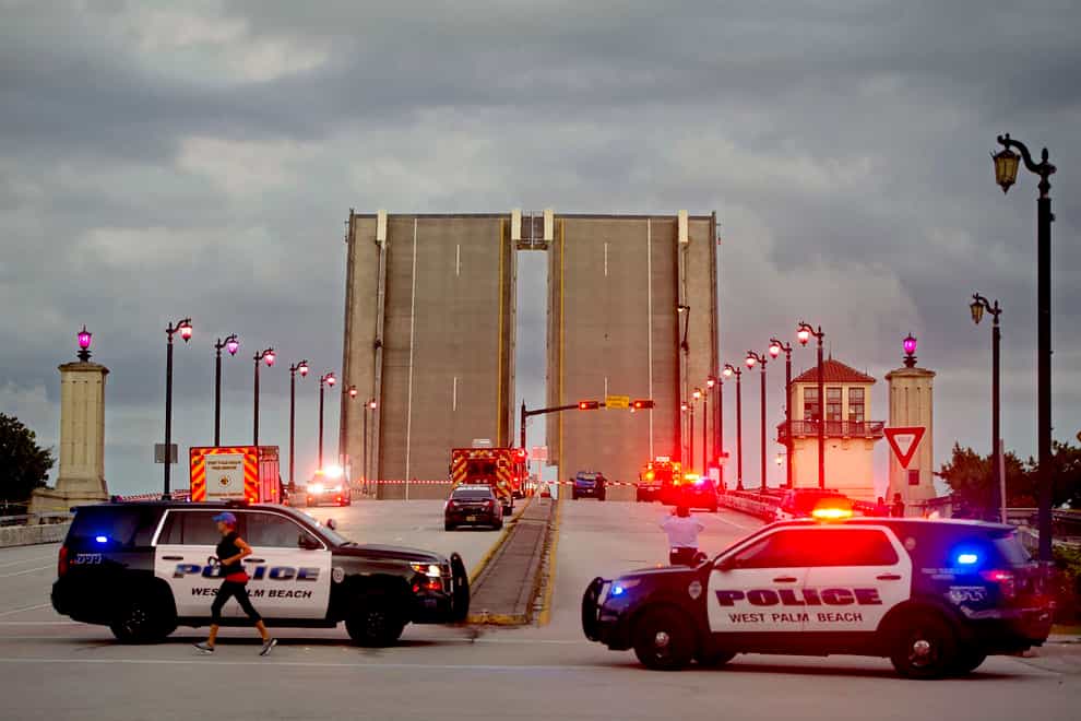 The bridge was closed to traffic following the incident (Meghan McCarthy/The Palm Beach Post via AP)
