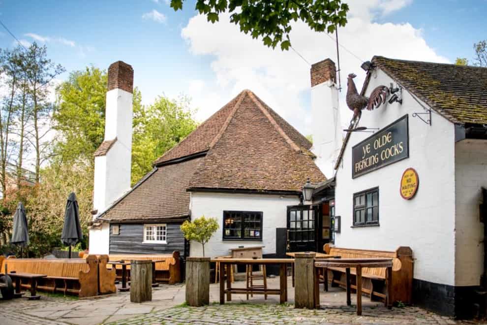 Ye Olde Fighting Cocks pub has closed due to Covid (PA)