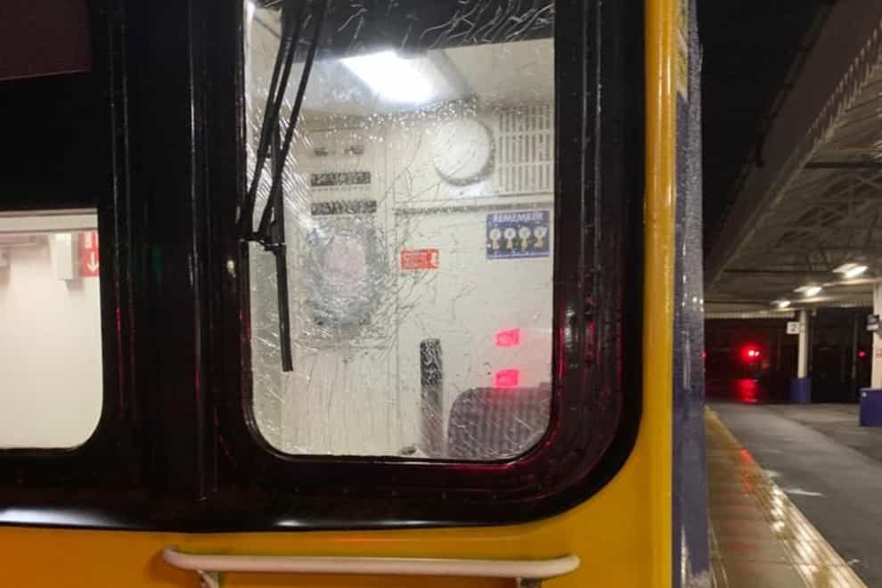 A train driver was hit in the face by shards of glass when his cab’s windscreen was smashed by a brick(Northern/PA)