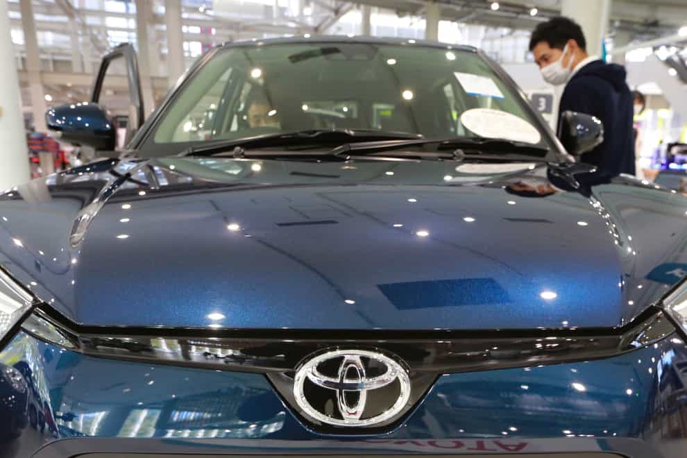 Toyota’s profit for the fiscal third quarter slipped nearly 6% (Koji Sasahara/AP)