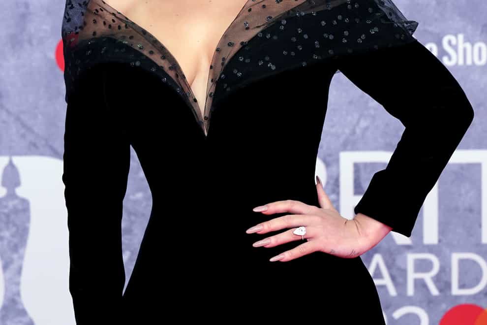 Adele looking stunning on the Brits red carpet (Ian West/PA)