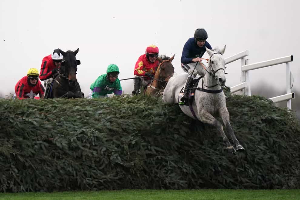 Snow Leopardess ridden by Aidan Coleman (right) clears The Chair before going on to win the Unibet Becher Handicap Chase at Aintree Raceource, Liverpool. Picture date: Saturday December 4, 2021 (Tim Goode/PA)