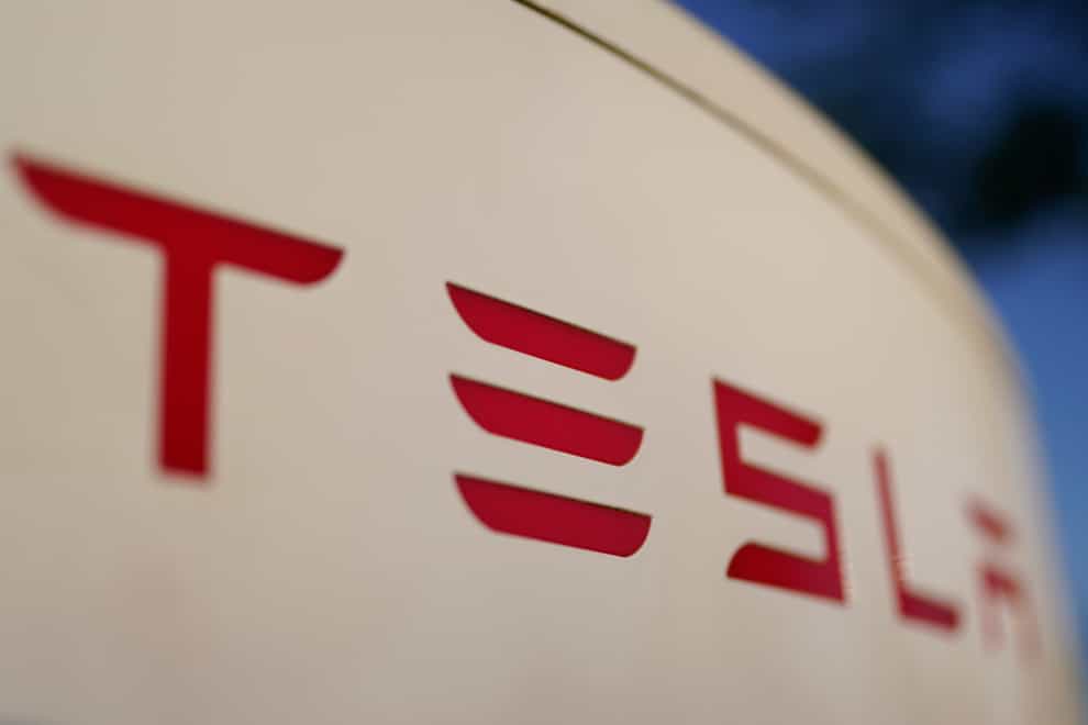 Tesla is recalling nearly 580,000 vehicles in the US because a “Boombox” function can play sounds over an external speaker and obscure audible warnings for pedestrians (AP)