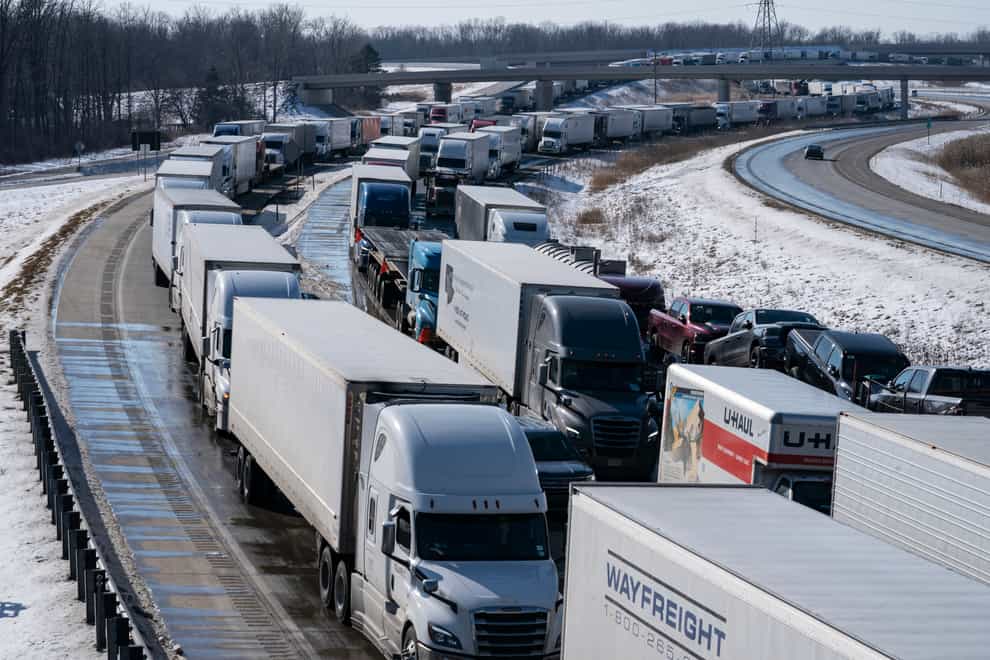 The lorry blockade by Canadians protesting the country’s Covid-19 restrictions is tightening the screws on the motoring industry, forcing Ford, Toyota and General Motors (GM) to shut down factories or otherwise curtail production on both sides of the US-Canada border (Mandi Wright/Detroit Free Press via AP)