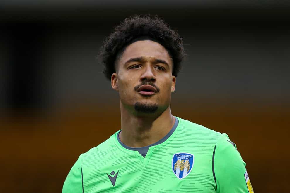 Colchester goalkeeper Shamal George has served out his ban (Isaac Parkin/PA)