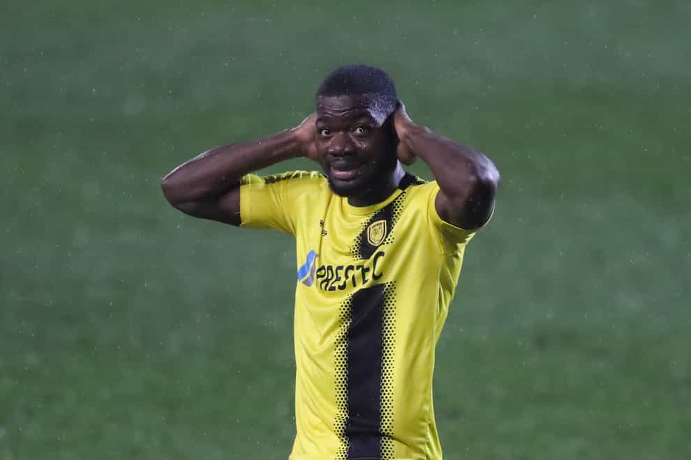Burton could still be without Deji Oshilaja for the visit of Cambridge (Isaac Parkin/PA)