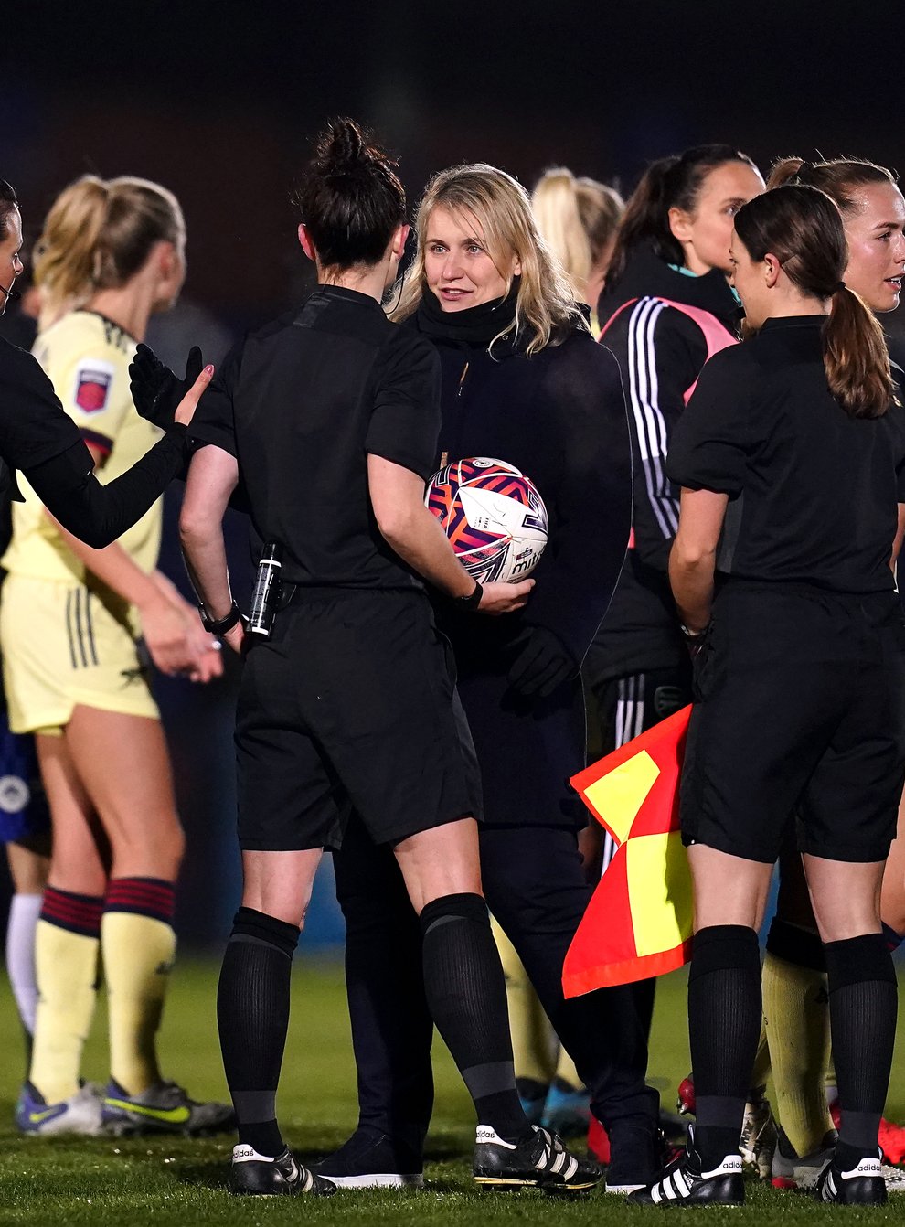 Chelsea manager Emma Hayes, centre, speaks to the officials after the goalless draw with Arsenal (John Walton/PA)