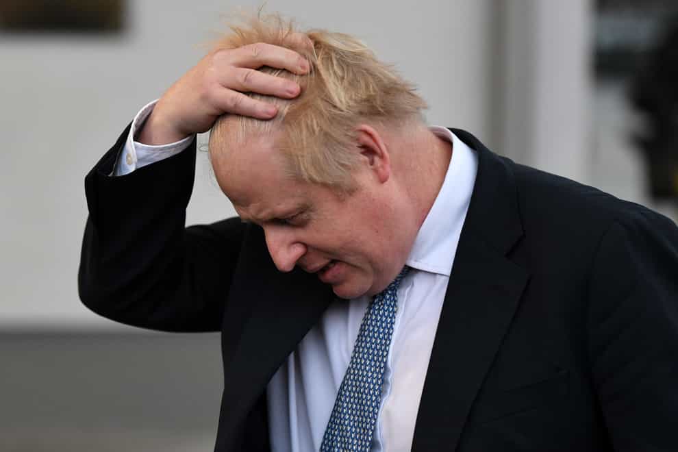 Prime Minister Boris Johnson before speaking with members of the media during a visit to Warszawska Brygada Pancerna military base near Warsaw, Poland, as tensions remain high over the build-up of Russian forces near the border with Ukraine. Picture date: Thursday February 10, 2022.