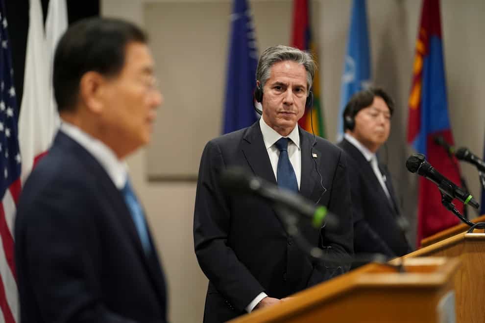 US Secretary of State Antony Blinken looks towards South Korean Foreign Minister Chung Eui-yong alongside Japanese Foreign Minister Yoshimasa Hayashi following their meeting in Hawaii (Kevin Lamarque/Pool/AP)