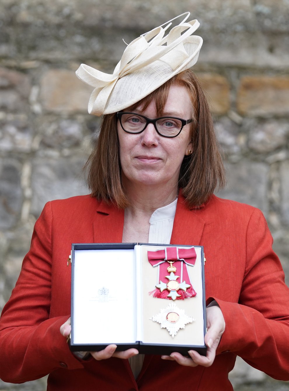 Professor Dame Sarah Gilbert from Oxford after she was made a Dame Commander of the British Empire by the Princess Royal at Windsor Castle (Steve Parsons/PA)