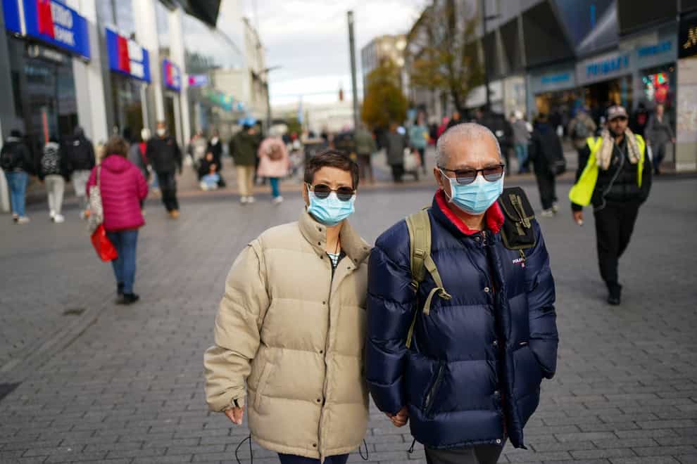 Shoppers wearing face masks in Birmingham (Jacob King/PA)